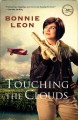 Touching the clouds a novel  Cover Image